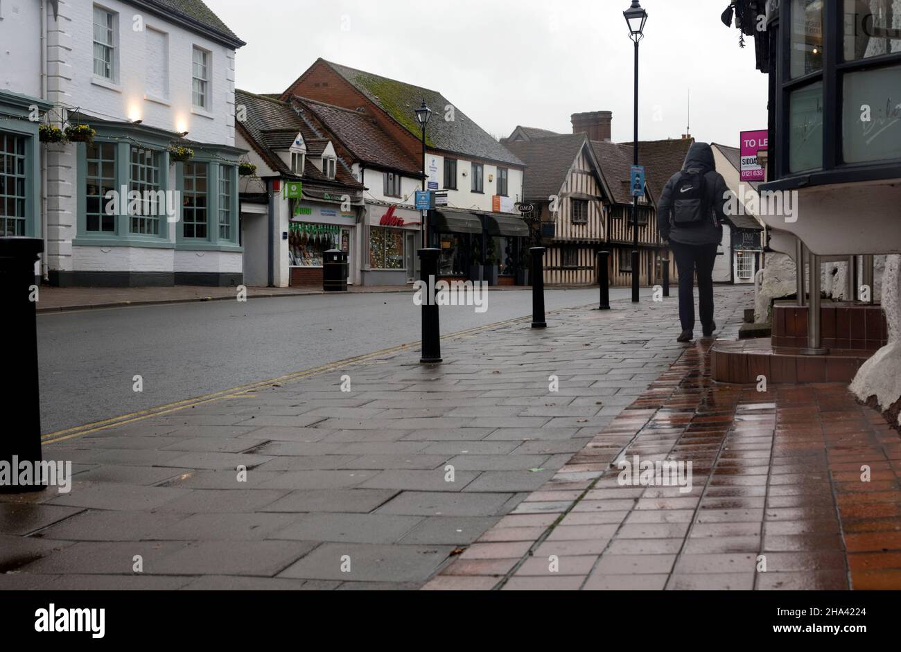 High Street on a wet winter`s day, Knowle, West Midlands, England, UK Stock Photo